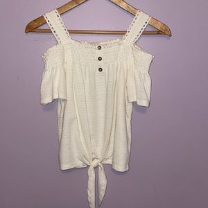 Cream colored off the shoulder too with buttons